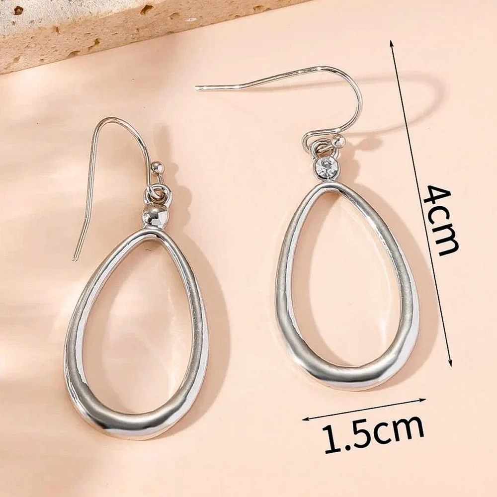 Any 2/$20! Shiny Silver Tubular Oval Drop Earrings - Picture 3 of 5